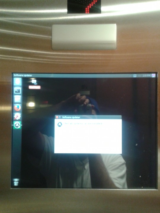 This elevator screen is showing an Ubuntu Unity desktop environment.