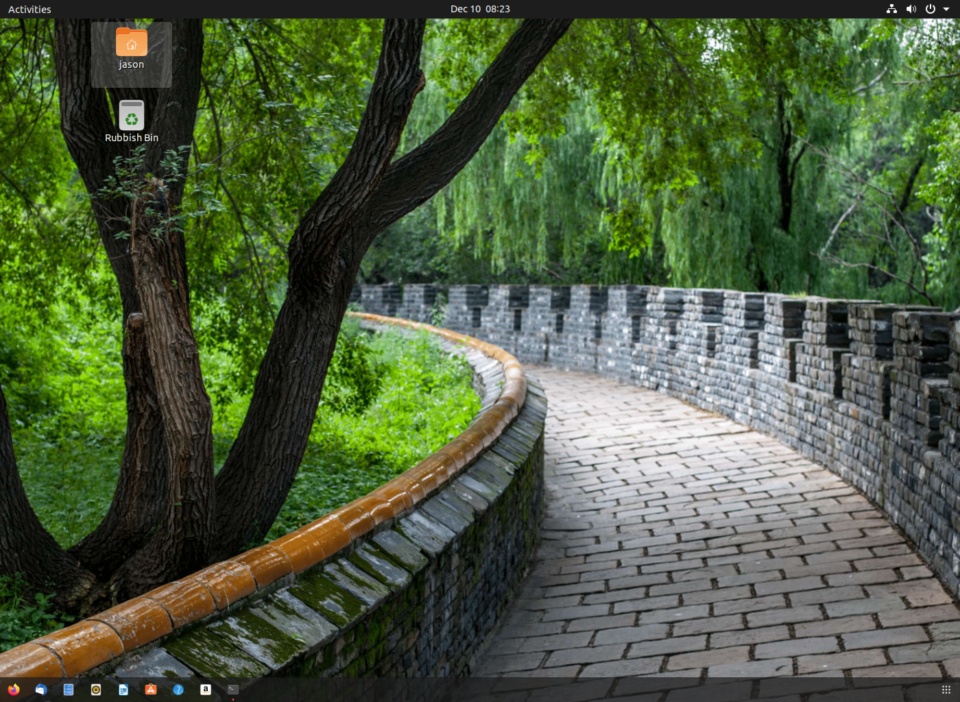 Ubuntu 20.04 desktop with dock on bottom and icon size shrunk down. Looks very good.