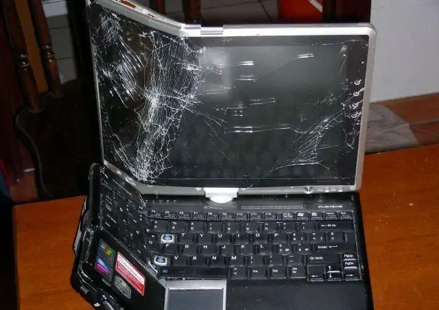 A laptop in quite poor condition.